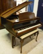 An early 20th Century mahogany cased baby grand piano,