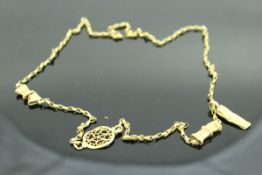 A Roman high carat gold Chieftan style necklace with hanging pendant and filigree-style decorative