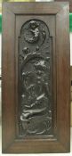 A Circa 1900 carved oak panel of scrolling form