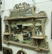 A 19th Century four plate wall mirror with applied scroll and floral gesso decoration together with