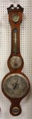 A circa 1900 mahogany banjo barometer / thermometer with broken arch pediment and silvered dial