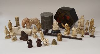 A collection of 19th Century and later carved ivory chess pieces, bobbin holder,