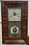 An American walnut cased drop dial wall clock by Jerome & Co.