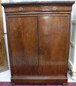 A late 19th Century French figured mahogany linen cupboard in the Louis Philippe taste,