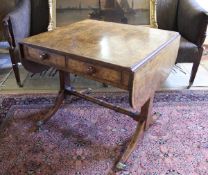 An early 19th Century burr yew veneered and rosewood cross banded drop leaf sofa table with two