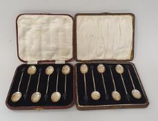 Two cased sets of six coffee bean spoons