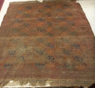 A Bokhara rug the central panel set with repeating medallions on a dark red,
