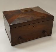 A Victorian mahogany sewing box of sarcophagus form,