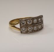 A Victorian 18 carat gold and diamond set ring, the ten stones set as two rows of five.