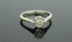 An 18 carat gold and solitaire diamond ring, approx 0.