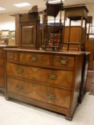 A collection of furniture comprising an early 20th Century walnut chest of three short over two
