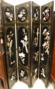 A 20th Century black lacquered and hardstone inlaid four-fold screen in the shibayama manner
