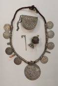 A tribal necklace made up of Maria Theresa coins,