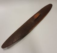 A late 19th/early 20th Century Aboriginal carved wooden parrying shield with all over carved