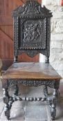 A 19th Century oak hall chair,