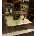 A coffee table with onyx top and brass base together with a similar glass topped occassional table,