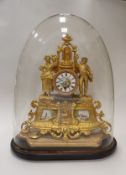 A late 19th Century French gilt metal cased thirty hour mantel clock with figural decoration under