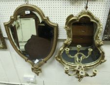 A 19th Century giltwood and gesso girandole mirror with shaped plates and C scroll decoration and