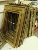 A collection of ten large picture frames, some giltwood and gesso, some plain,