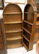 A pair of mid-20th Century oak waterfall open bookcases with domed tops CONDITION REPORTS