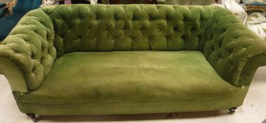 A Victorian upholstered scroll arm Chesterfield sofa in green velvet