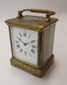 A brass mantel clock,