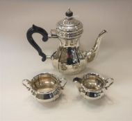 A Danish silver three piece tea set comprising teapot,