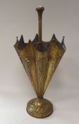 A late Victorian embossed brass seven section stick / umbrella stand as a half open parasol or