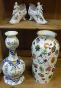 A French faience octagonal faceted baluster shaped vase,