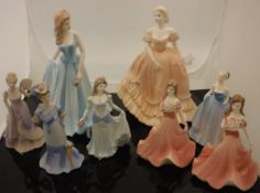 A collection of Coalport figurines including "Louisa",