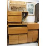 A collection of Tapley 33 teak cupboards,