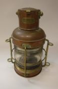 A brass mounted copper ship's lantern bearing plaque inscribed "Fay and Son Southampton"