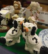 A pair of Beswick Staffordshire style spaniel ornaments and two pairs of Continental biscuit fired