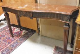 A reproduction mahogany serpentine fronted serving table in the Adam style together with a tripod