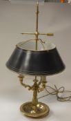 A 20th Century gilt brass three light table lamp with arrow and scrolling acanthus decoration in