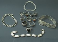 A collection of ten various silver rings and four silver and stone set bracelets, total weight 4.