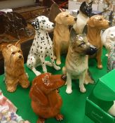A collection of Beswick fireside ornaments including "Dachshund", "Terrier", "Dalmatian",