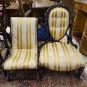 A Victorian ebonised salon chair with gold and cream upholstered back and seat raised on turned