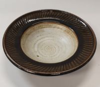 DAVID LEACH (1911-2005) - a fluted stoneware dish, impressed potter's mark under glaze to base,