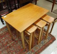 A mid 20th Century nest of four tables designed by Poul Hundevad for Novydomov