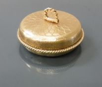 A 9 carat gold engine turned pill box the top inscribed "Asprey", 12.