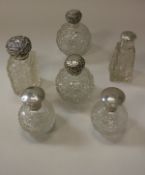 A pair of silver mounted cut glass grenade scent bottles,