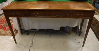 A walnut and cross banded side table,