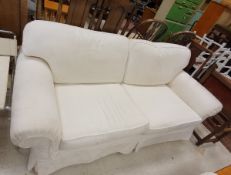 A Multi York two seat sofa with loose cushions and a pair of matching armchairs