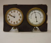 An early 20th Century travelling barometer and clock face for J.C.