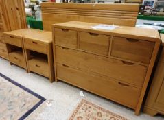 An Ercol "Bosco" bedroom suite comprising chest of three short over two long drawers,