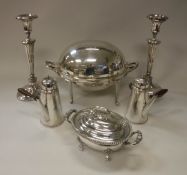 A pair of plated Adam design candlesticks, a pair of plated cafe au lait pots,