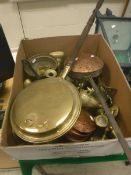 A box of various copper and brassware to include two pine handled copper chestnut roasters,