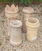 Four various terracotta chimney pots