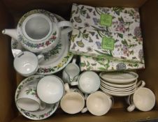 A box containing Worcester Herbs dinner and tea wares and Portmeirion Botanic Garden wares and a